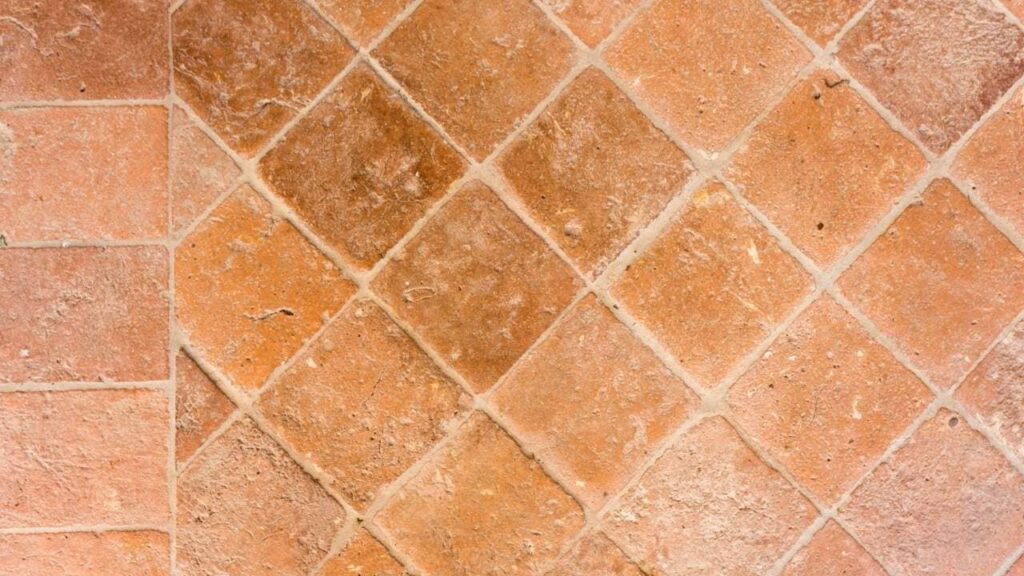 Close-up view of terracotta tile floor after professional tile installation in Conyers GA and Atlanta GA.